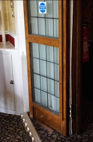 Fire door held open