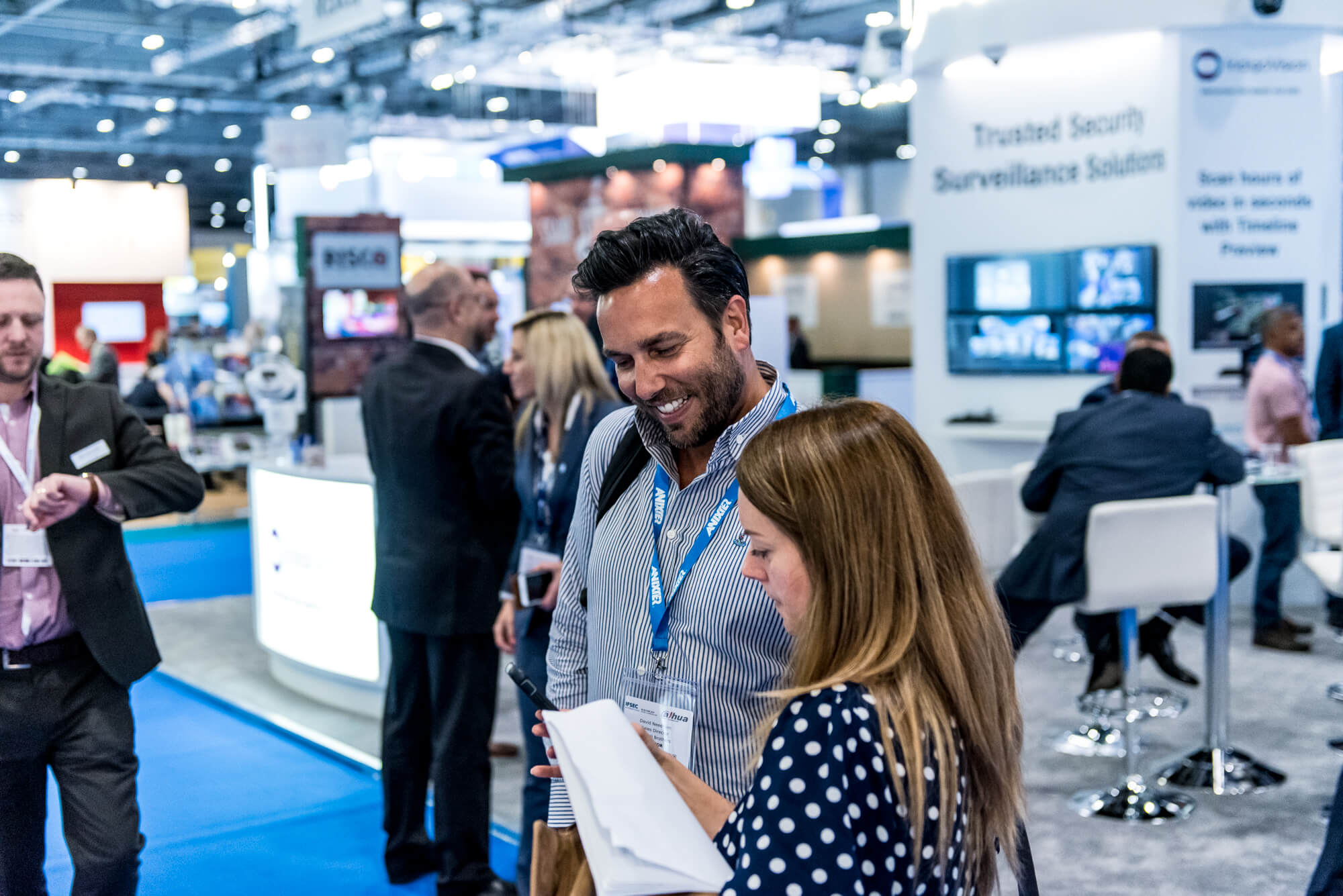 Two visitors networking at IFSEC 2019